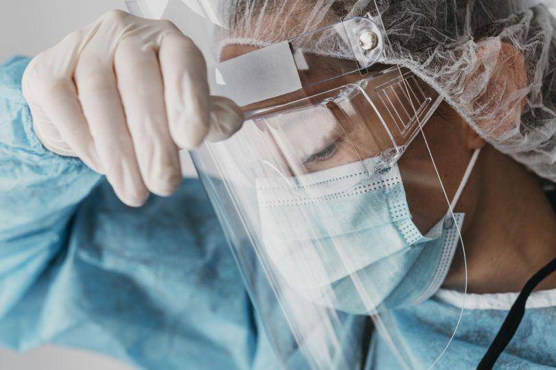 Doctor Wearing Protective Equipment